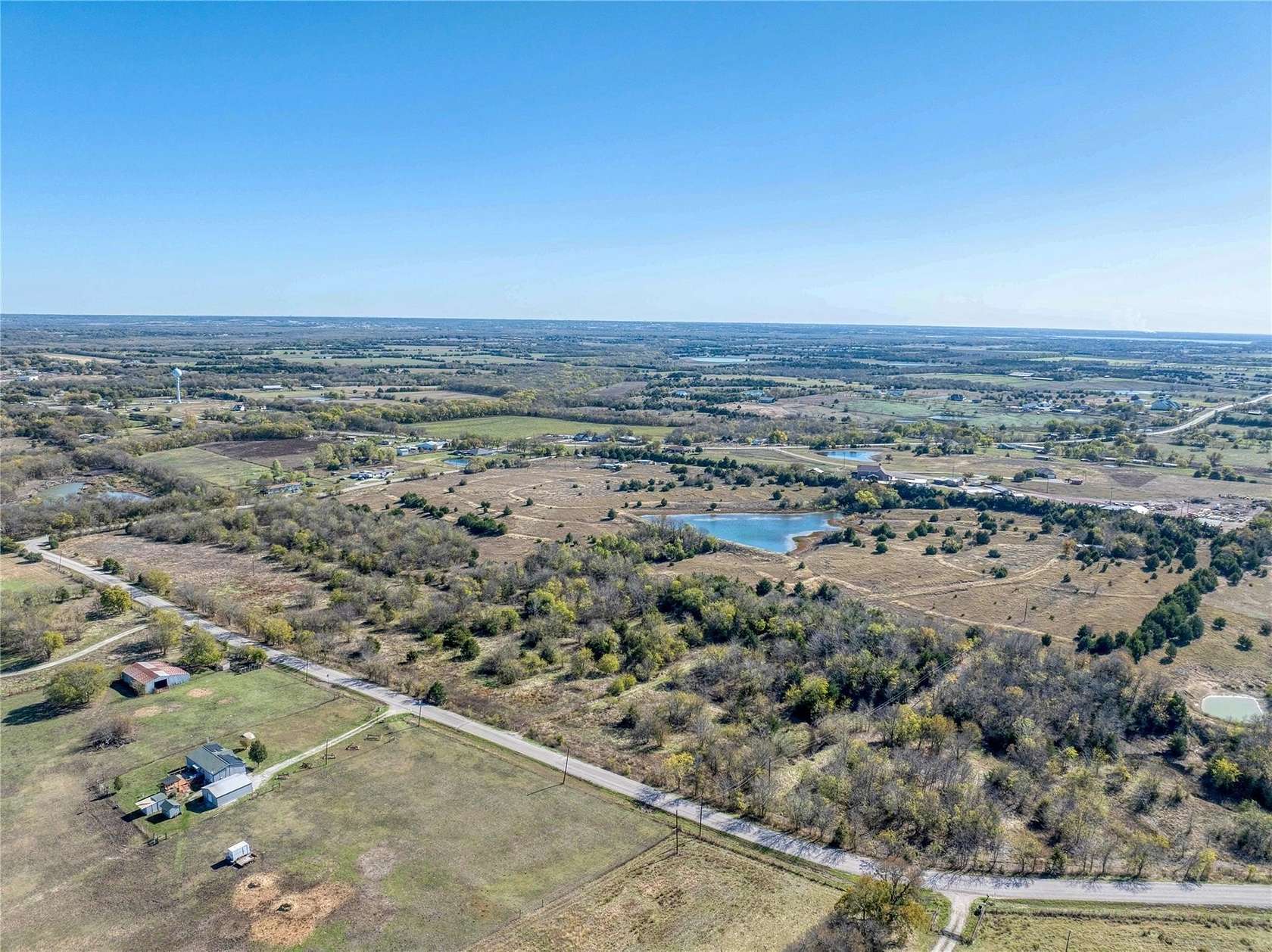 Listing photograph of the acreage at 10420 County Road 470 in Blue Ridge, Texas