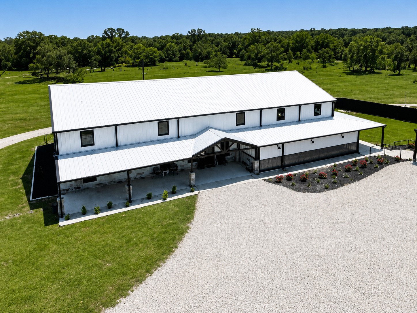 1235 Kelley Woods Lane property with the Magnolia House in Franklin, Texas