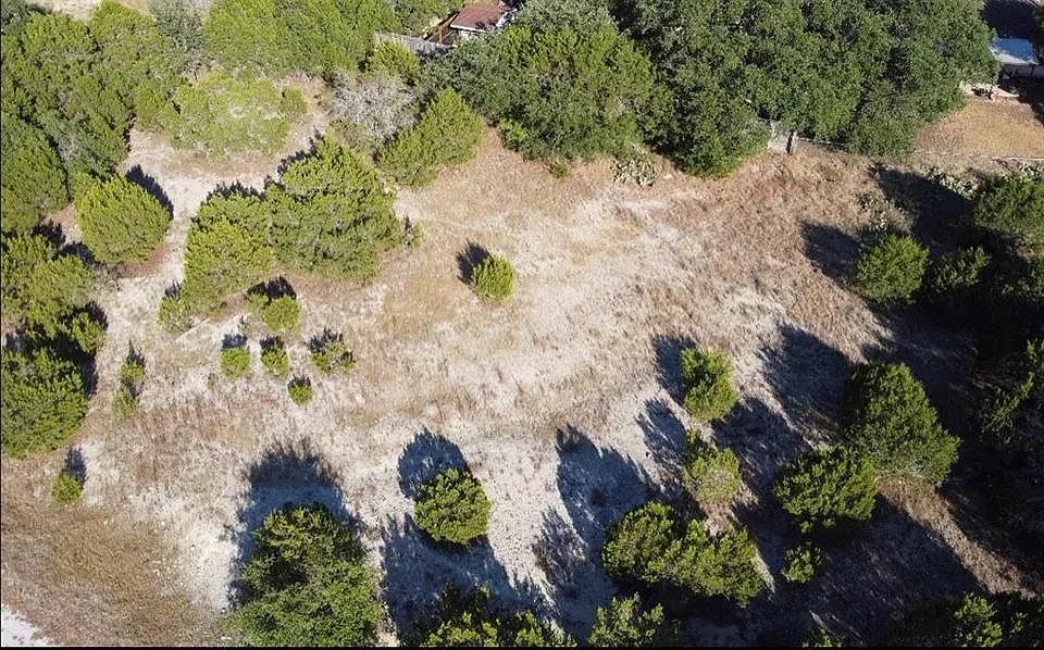 Listing photograph of the lot at 2105 Thurber Lane in the Lago Vista area of Texas