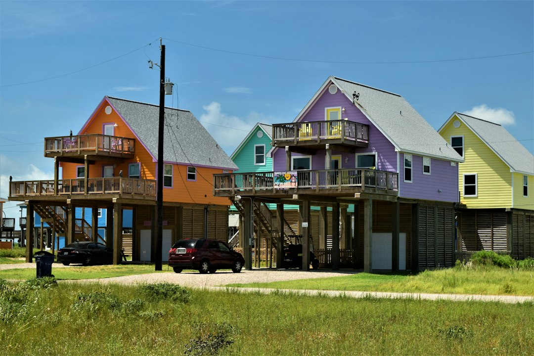 Colorful coastal homes representing Galveston and League City rental properties