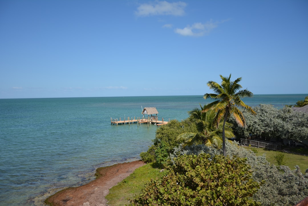 Waterfront home and tropical water representing Islamorada Florida seller coverage