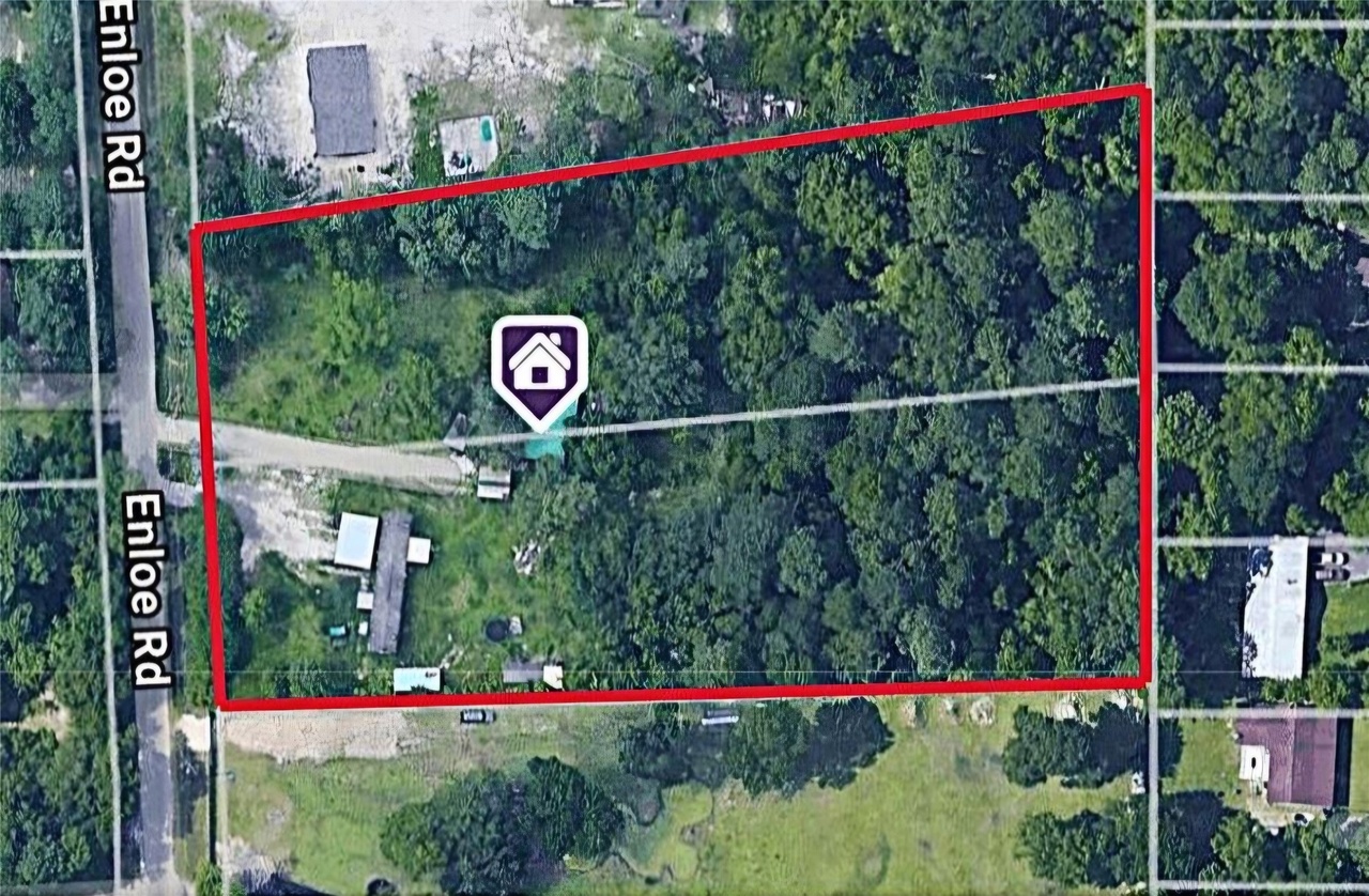Aerial listing image of 24169 Enloe Road in Porter, Texas, with a marketing boundary outline