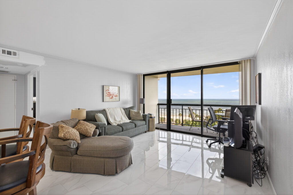 Living room at 5220 Seawall Boulevard Unit 735, Galveston, photographed for Eaton in May 2026