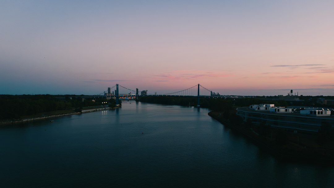 Aerial view of Toledo as the sun sets in warm tones.