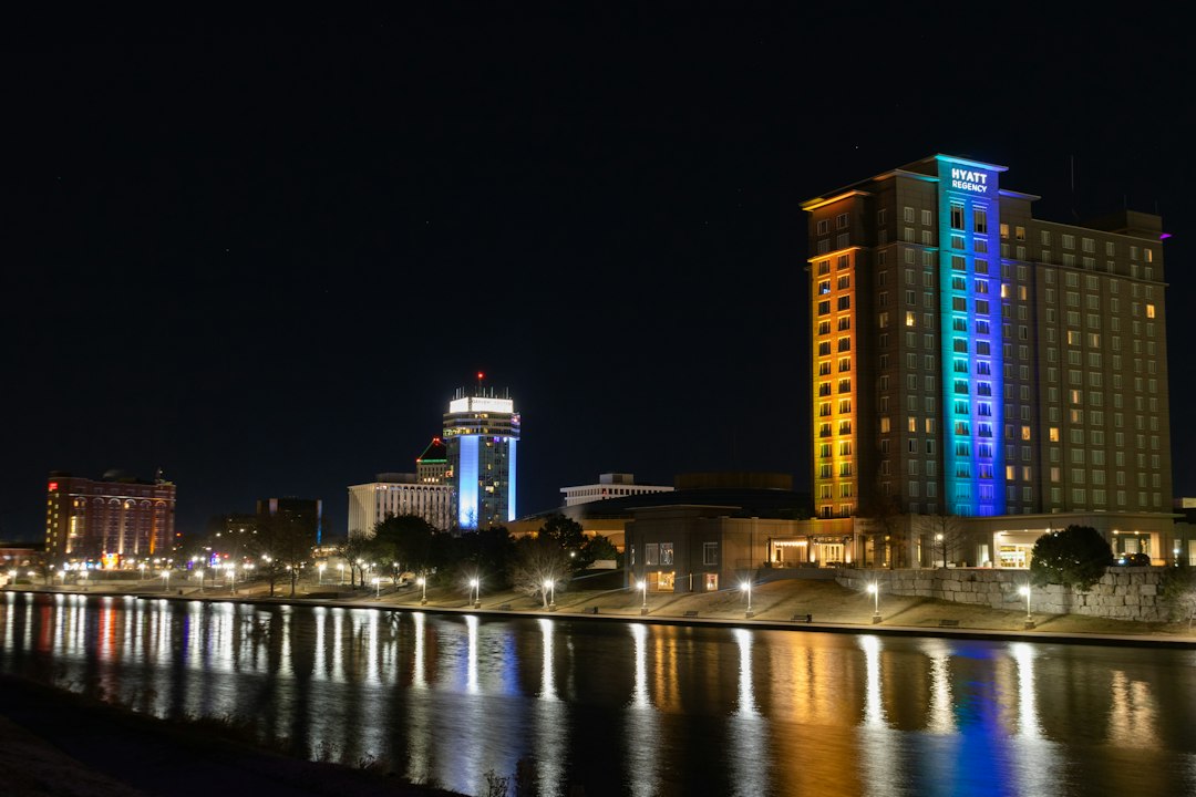 Night skyline of Wichita Kansas with river in foreground